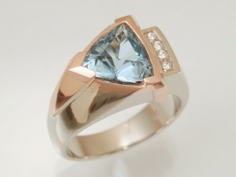 trillion cut blue topaz ring in 14k white and rose gold