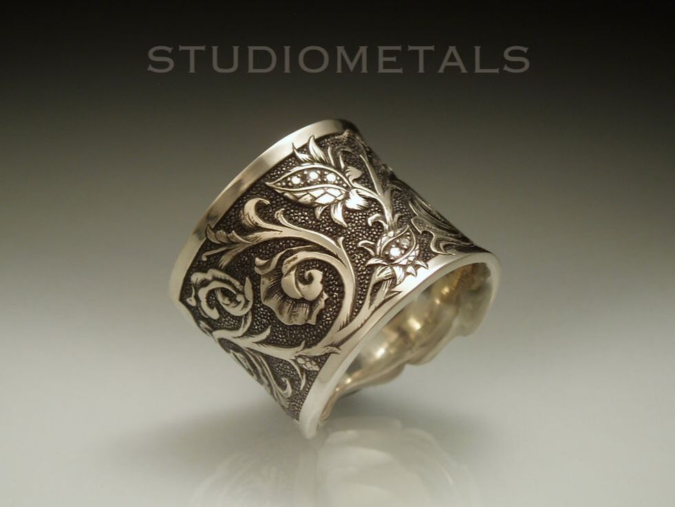 western style hand engraved ring in sterling silver, pave set with diamonds