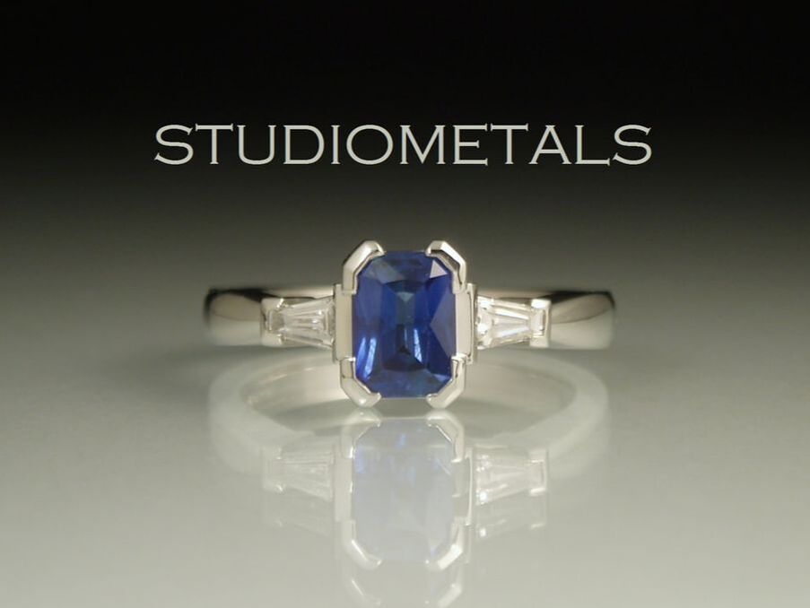 radiant cut blue sapphire and diamond baguette ring