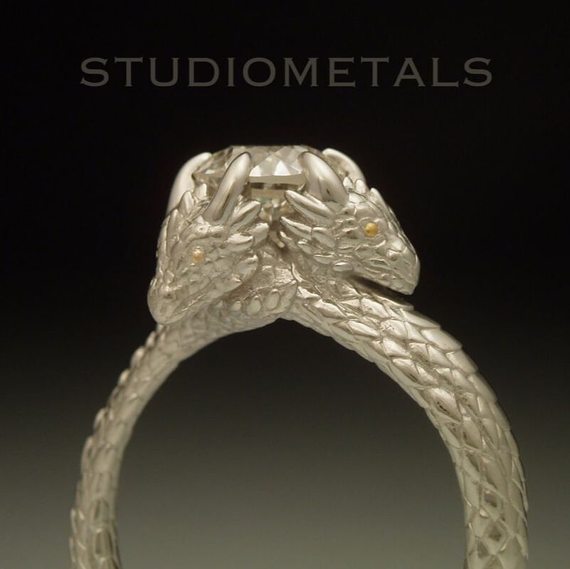 Khaleesi, Game of Thrones inspired 1.3 carat diamond engagement ring with three dragons.
