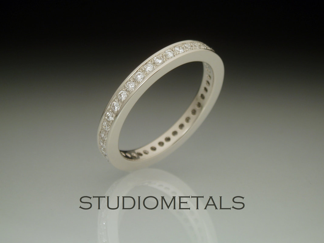 3mm wide diamond eternity wedding ring in 14k white gold