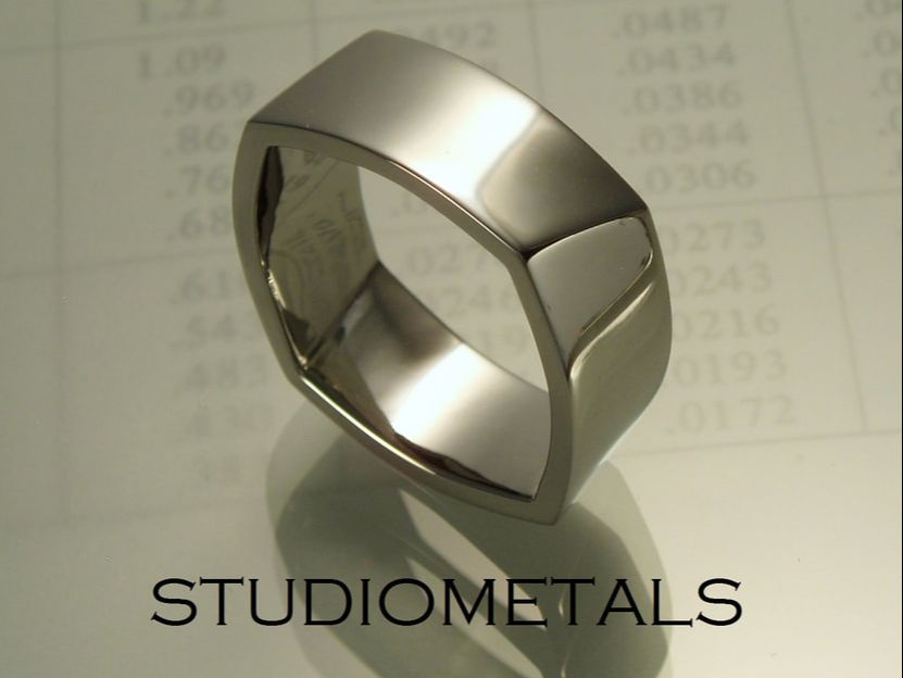 8mm torque soft square men's wdding band in 19k white gold.