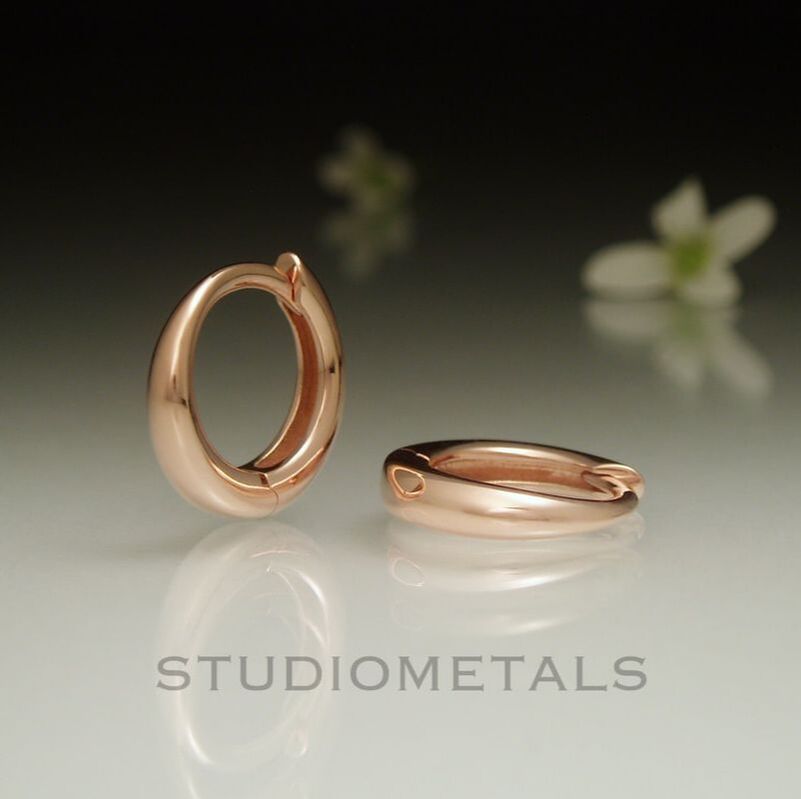 Rose gold 12mm round huggie sleeper hop earrings with hinges.