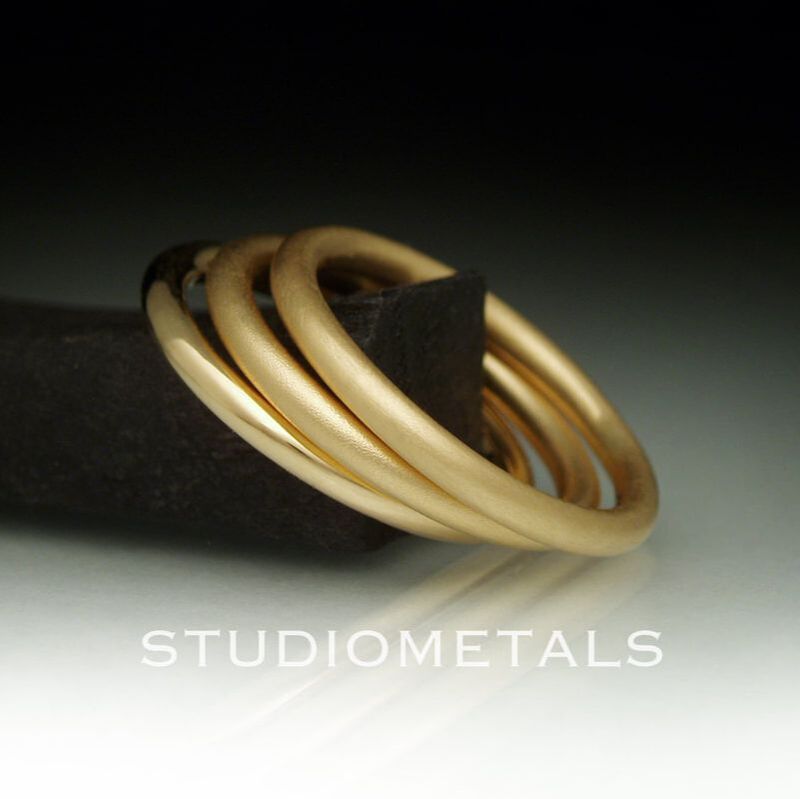 2mm round, solid 18 kt yellow gold stacking rings.