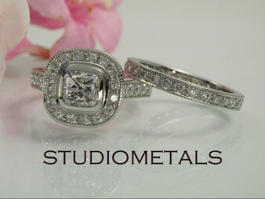 cushion cut diamond halo engagement ring and eternity band 