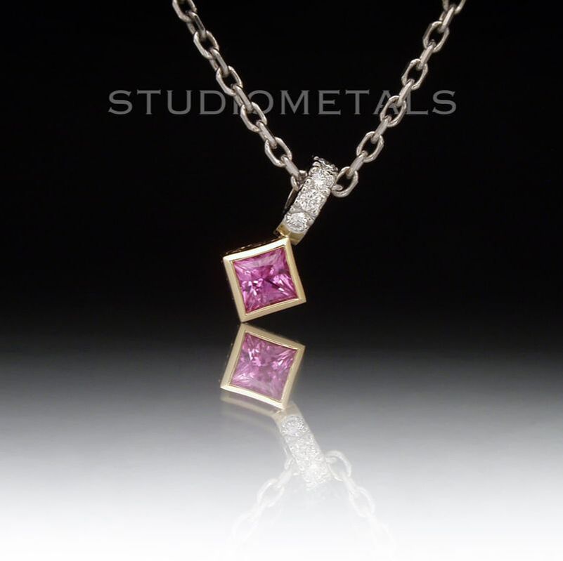 Hot pink, princess cut sapphire bezel pendant with natural diamond details and hand engraving, a elegant, one of a kind gift for her, in solid 18k and 14k gold.