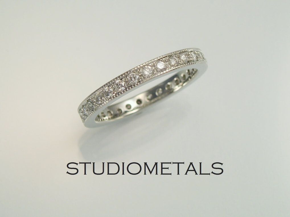 2.5mm diamond eternity ring in 19k white gold with milgrain edges