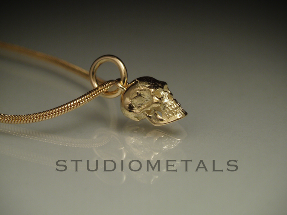 8mm realistic skull charm in solid 14k yellow gold 