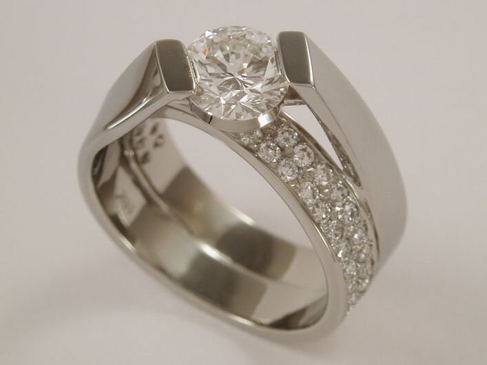 modern floating diamond engagement ring with pave
