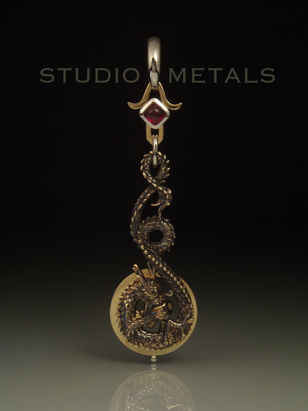 tea with black dragon narrative, custom designed pendant