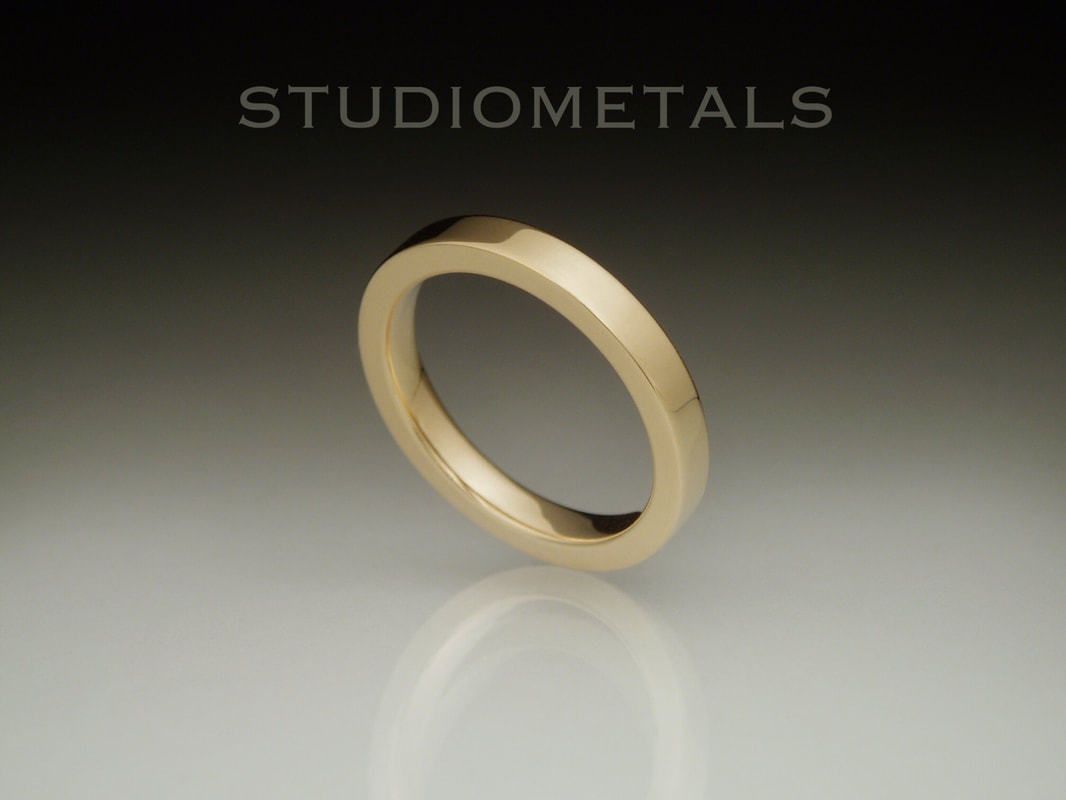 2.5mm flat top womens wedding band in 14k yellow gold