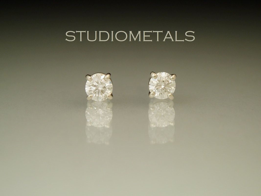 Elegant Diamond Studs - White Gold (Size: 0.30 Carat Total Weight)