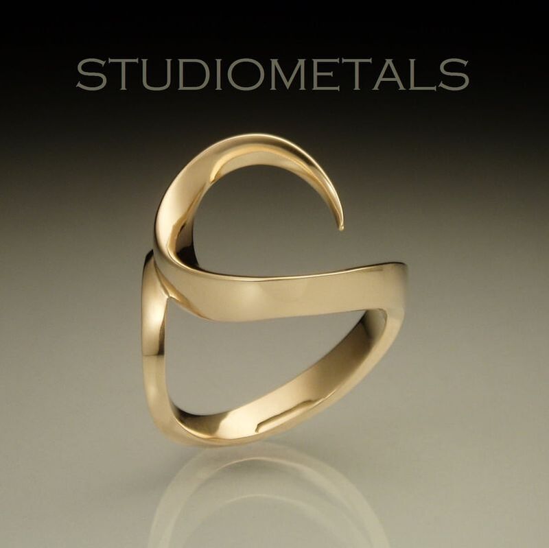 Asymmetrical, solid 14k gold wave ring for middle finger or index finger. 