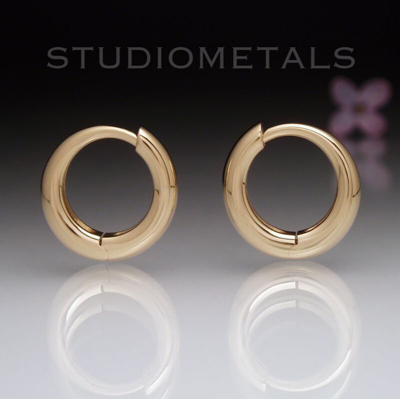 14mm round hoop earrings with hidden hinge in solid 18 k yellow gold.