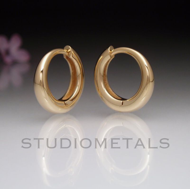 14mm round hinged hooped earrings in solid 18k yellow gold.