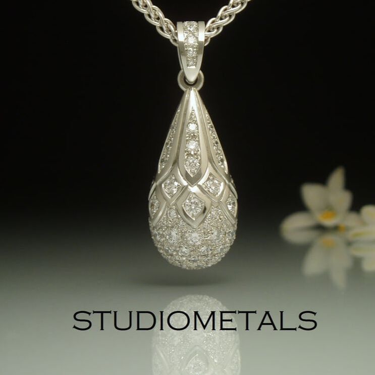 vs diamond teardrop pendant in 19k white gold