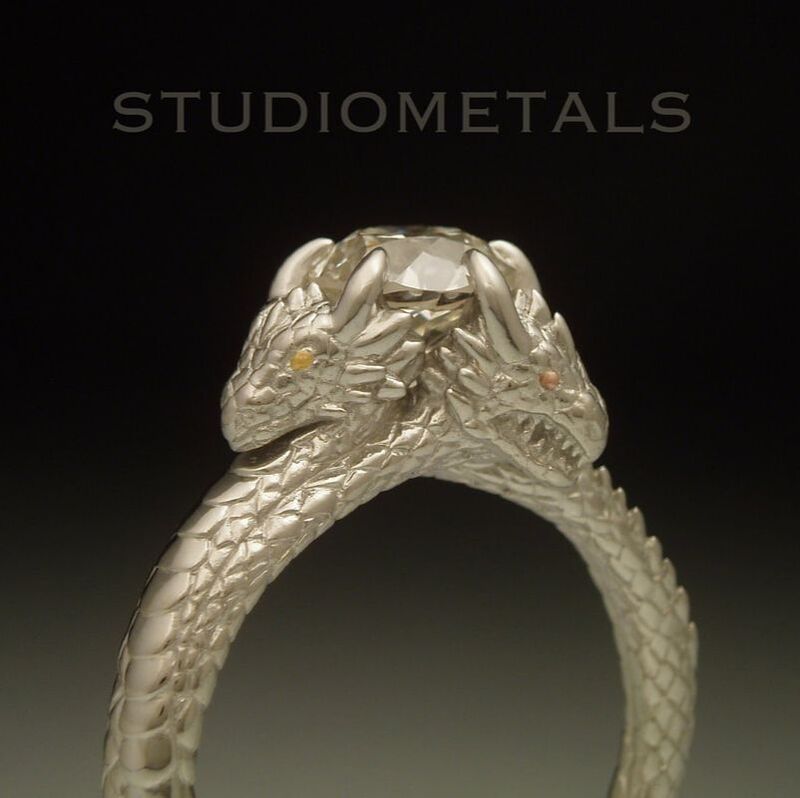 1.3 carat diamond set in three dragon engagement ring