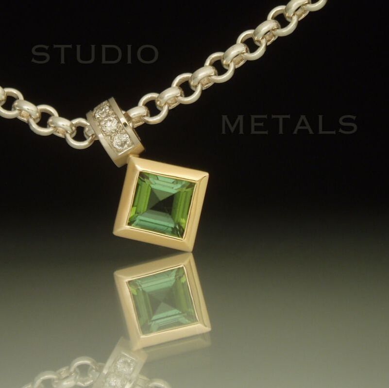 square green tourmaline and diamond pendant in 14k gold