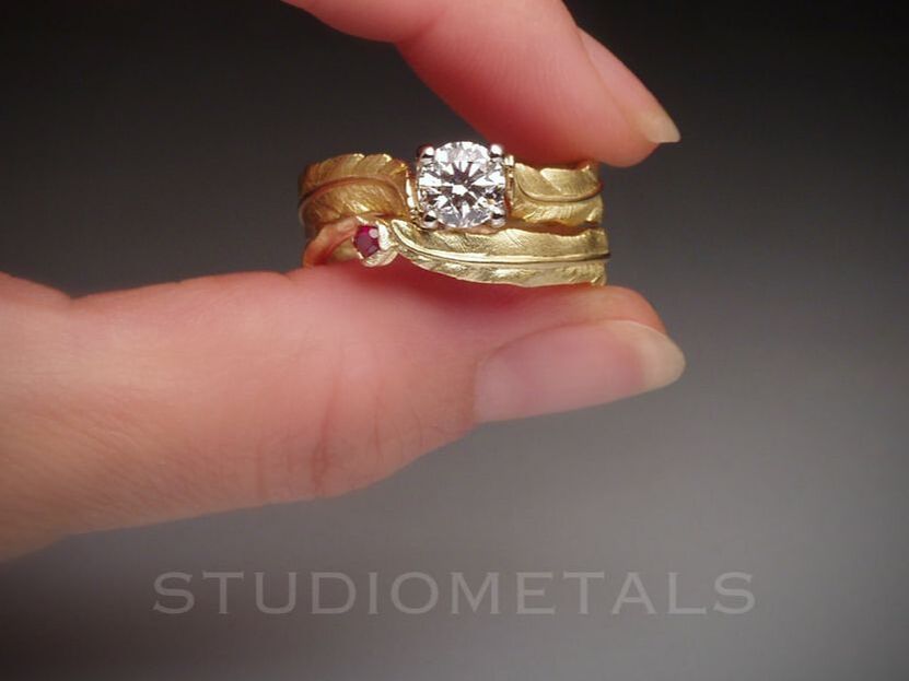 Hand carved 18k yellow gold, women's feather wedding set with 1 carat diamond and ruby accent.