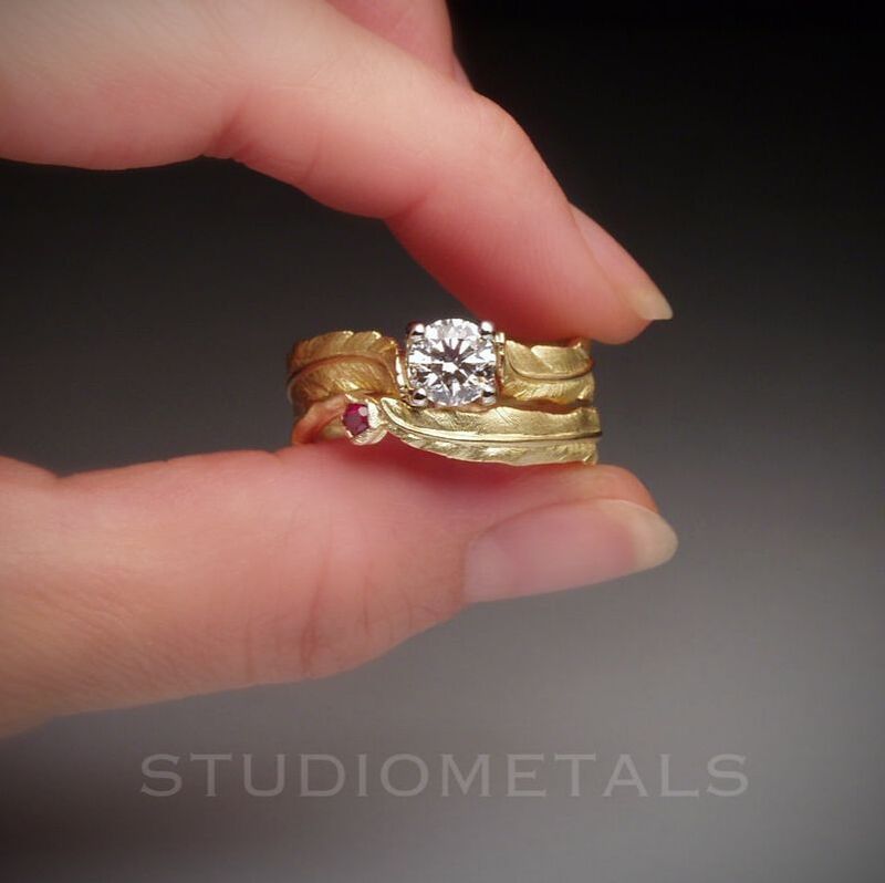 Hand carved 18k yellow gold, women's feather wedding set with 1 carat diamond and ruby accent.