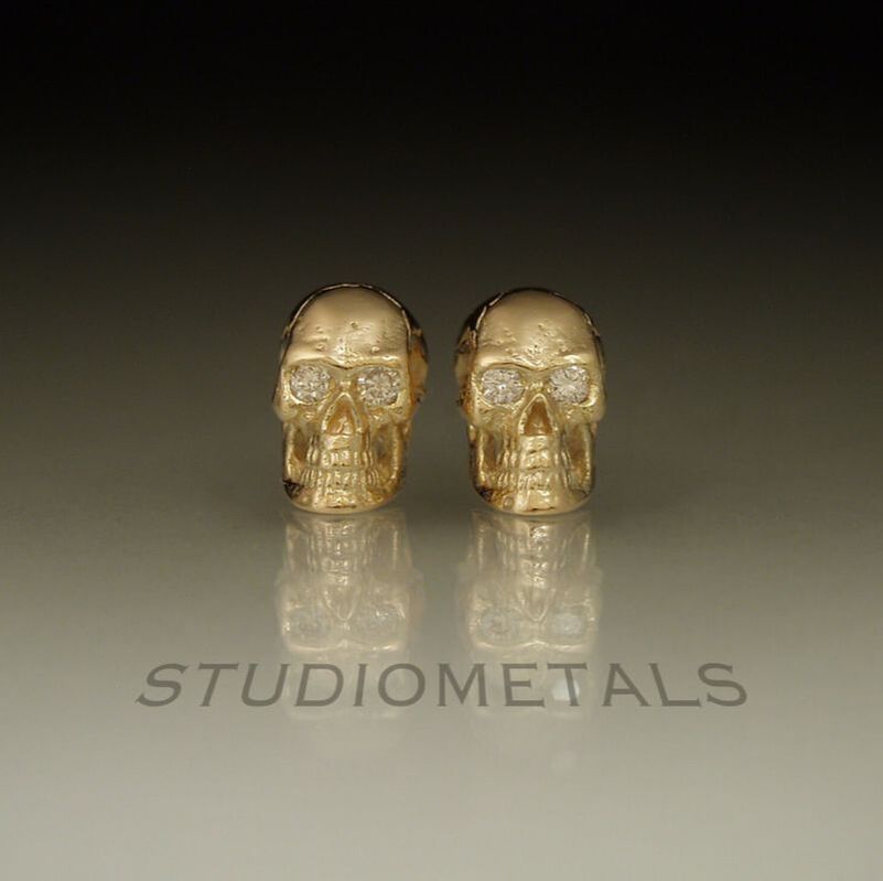 14k yellow gold full skull stud earrings with diamond eyes