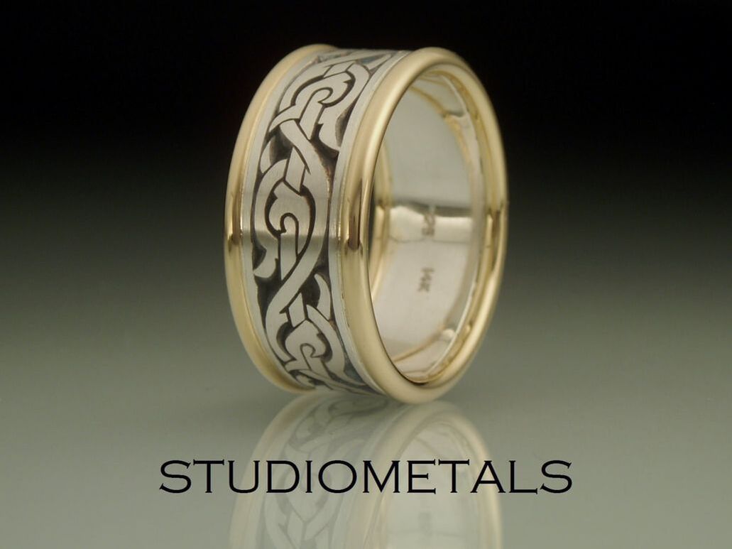 Hand engraved Nordic design ring in sterling silver and 14k yellow gold 