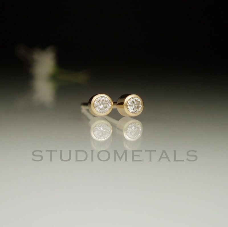 2mm diamond bezel stud earrings in solid 14k yellow gold